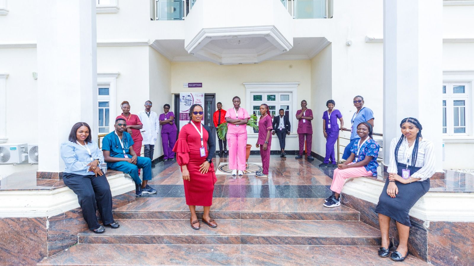 The MLOSH Clinics team outside the clinic